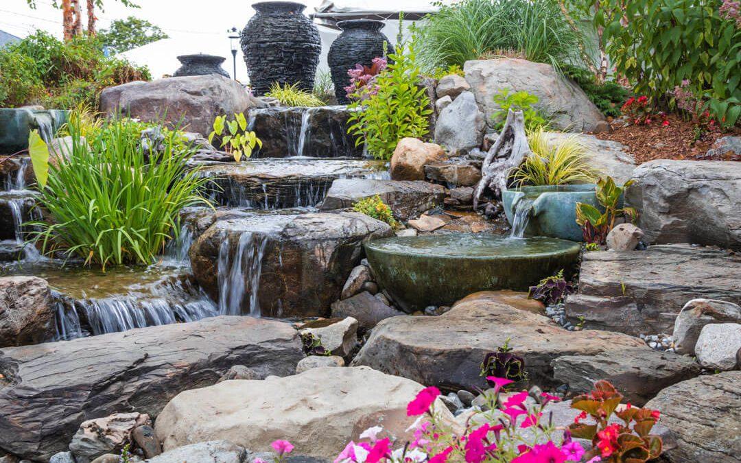 Landscape architecture with waterfall features for summer garden