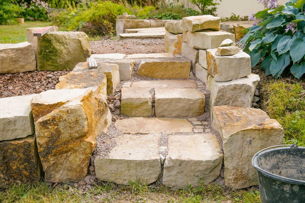 building a rock foundation with walls for landscaping