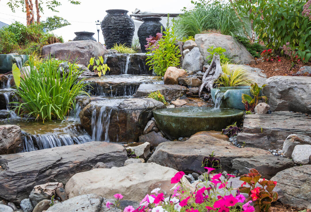 Landscape architecture with waterfall features for summer garden